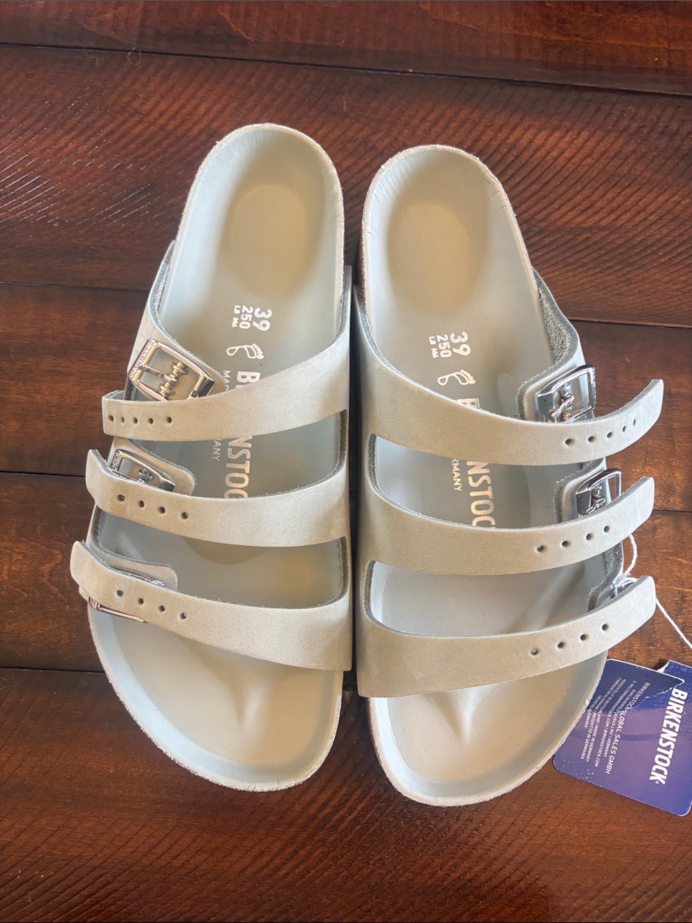 Birkenstock Women's Triple-Strap Sandals in Light Taupe with Silver Buckles